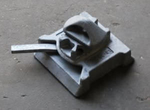 Twistlock zum Festzurren von Containern / Schwalbenschwanz