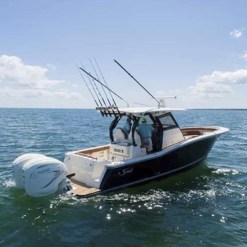 Außenborder-Konsolenboot - 330 LXF - Scout Boats - zweimotorig / mit Mittelkonsole / Sportfischer
