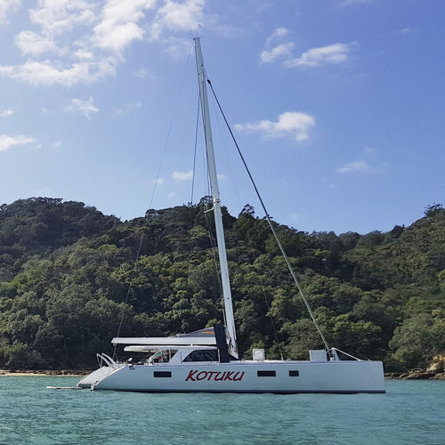 Baum für Segelyachten - Multihull - Hall Spars & rigging - Rollreffanlage / V-förmig / Carbon